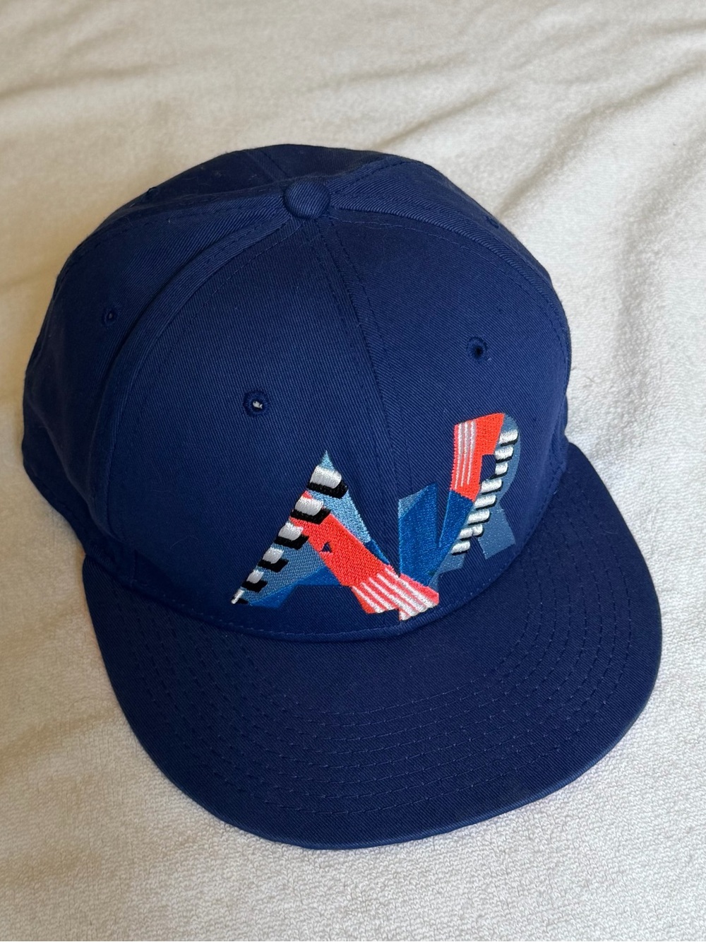 Nike True ‘Air’ SnapBack Cap in blue pink and white